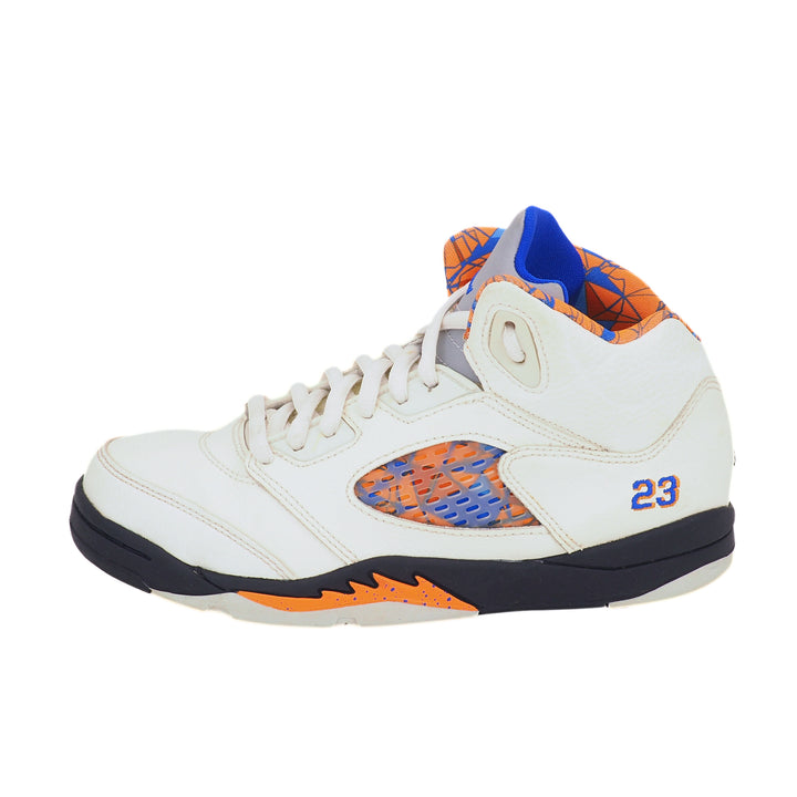 White Air Jordan 5 International Flight sneaker with orange and blue accents on a white background