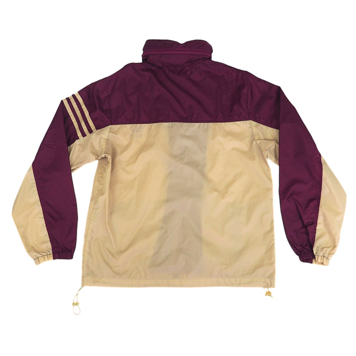 Two-tone vintage adidas jacket with maroon and beige colors on a white background