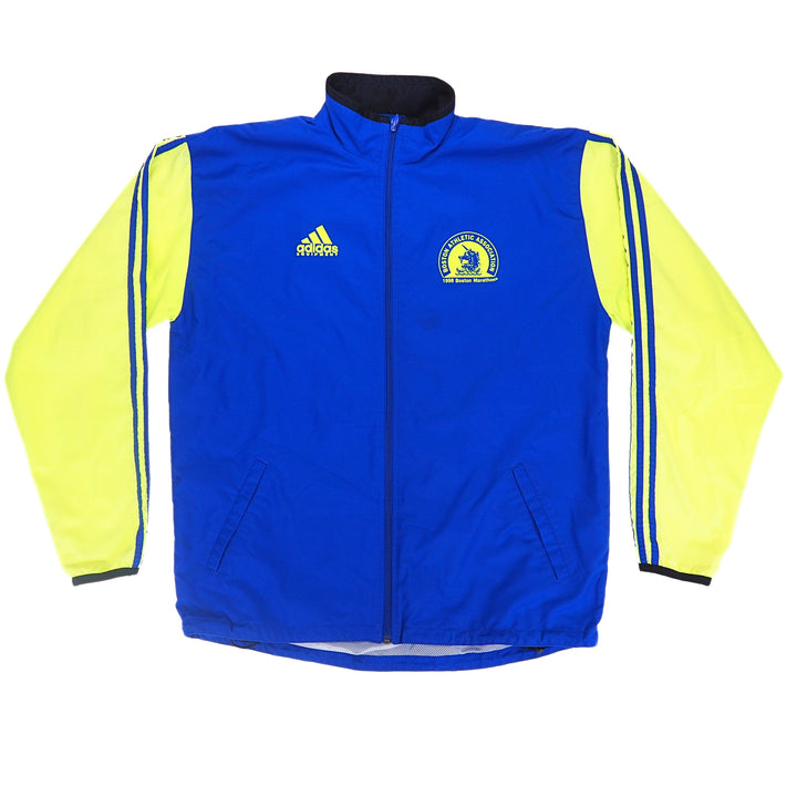 Front view of a blue jacket with neon yellow sleeves.