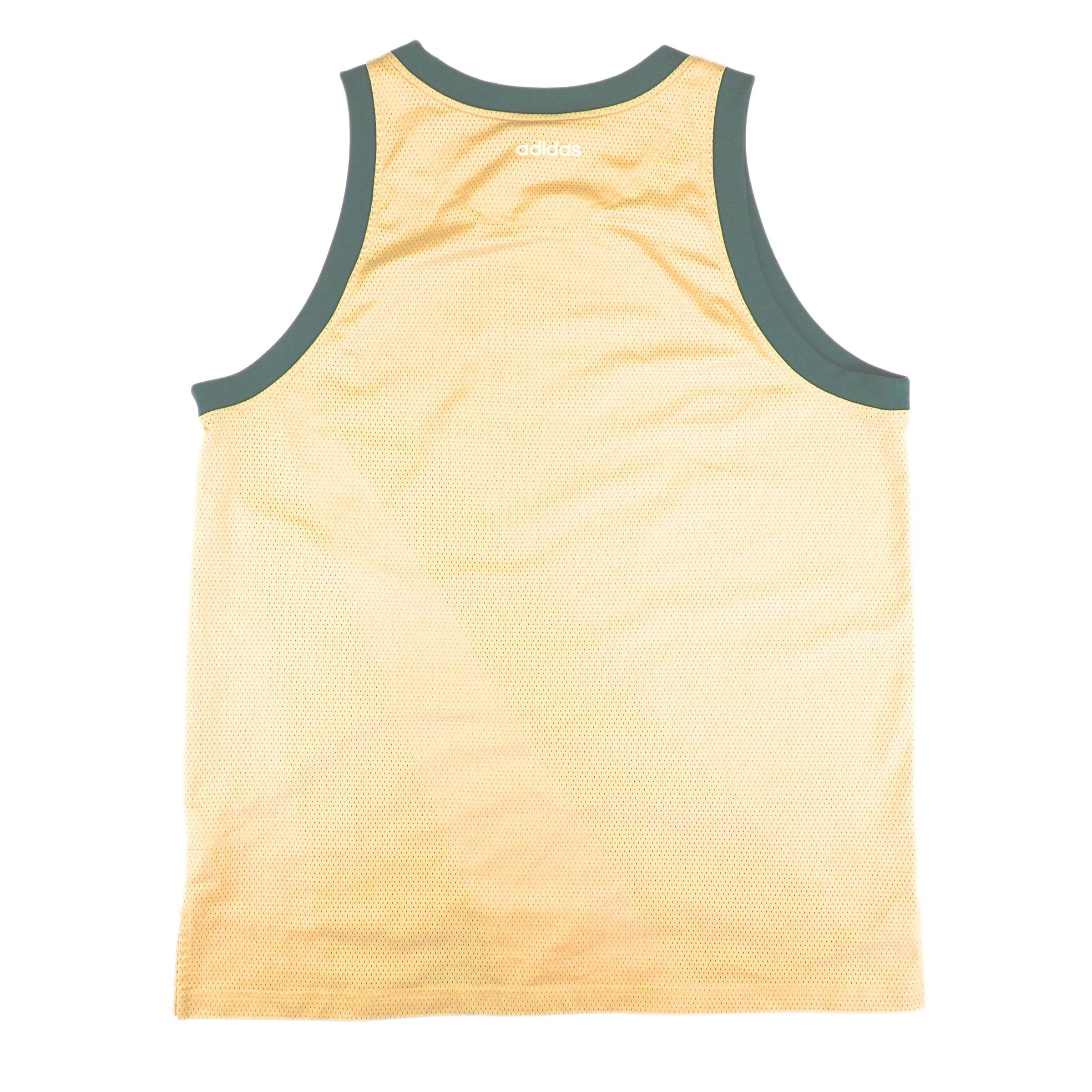 Gold basketball jersey with green trim on a white background