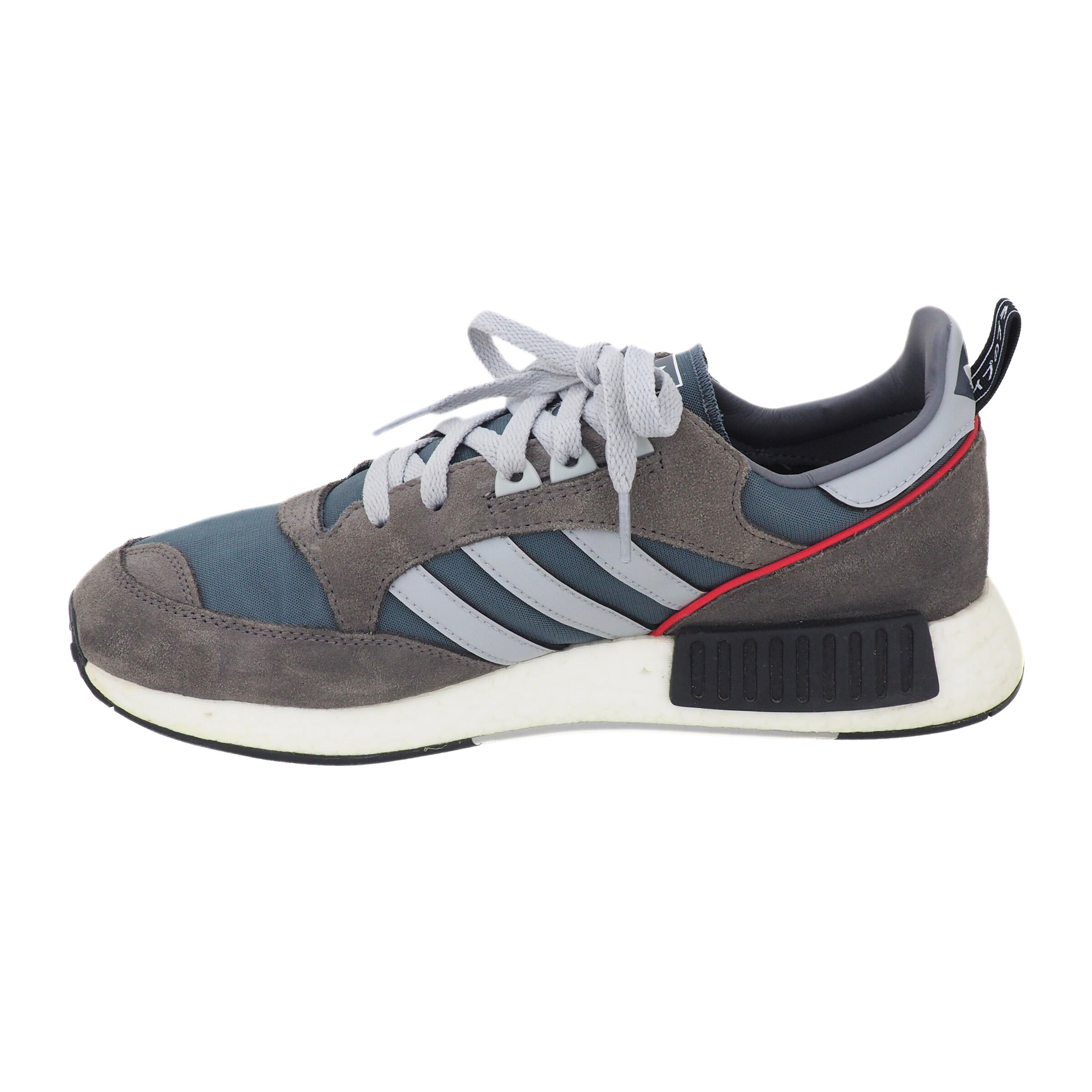 Gray and blue sneaker with white stripes on a white background
