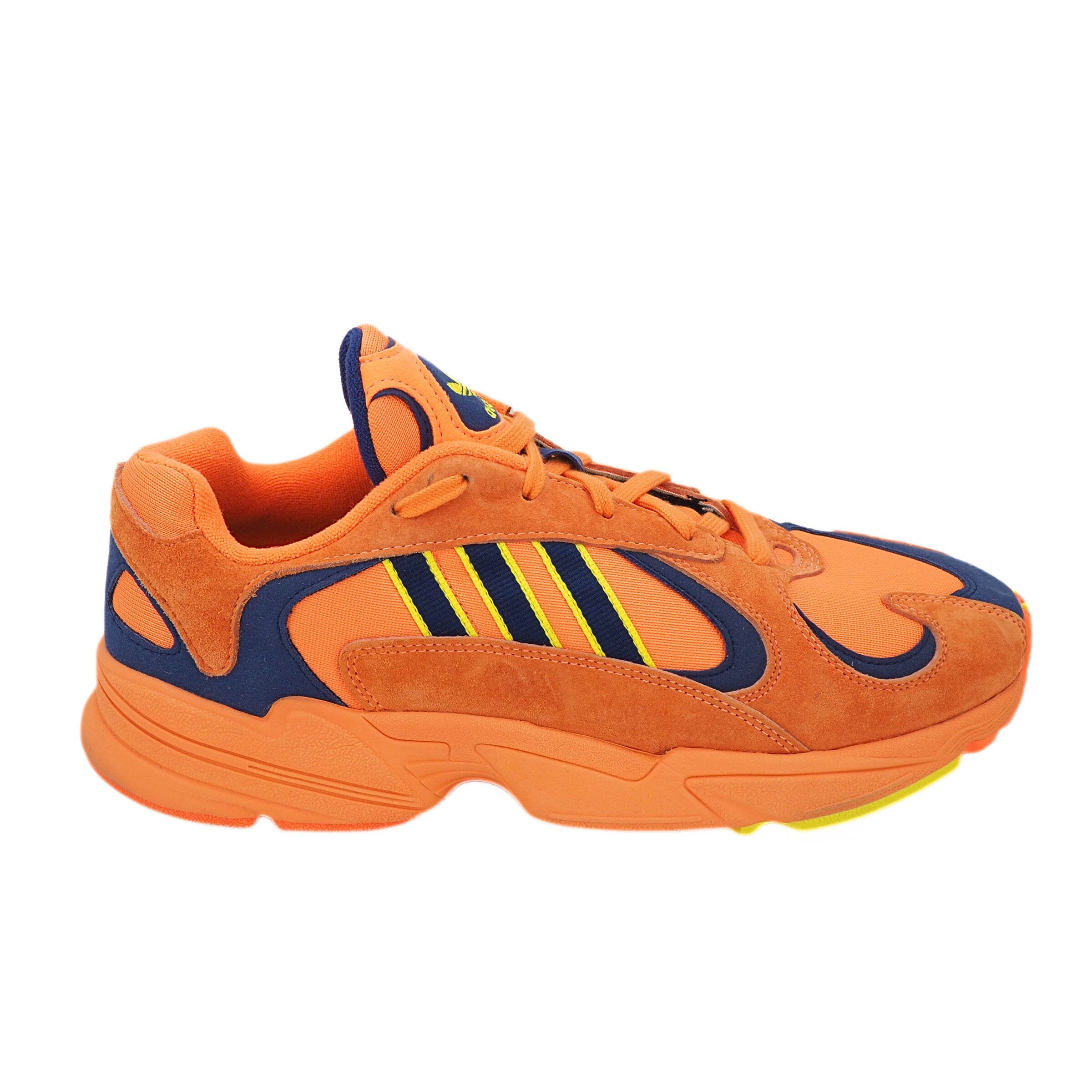 Orange and blue Adidas sneaker with a prominent 3 stripe brand logo on a white background