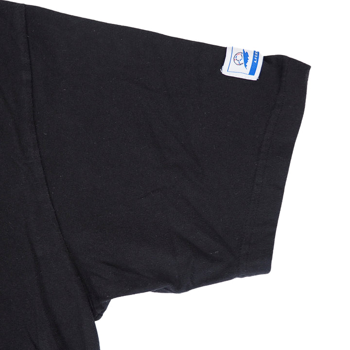 Close up of a black t-shirt sleeve on a white background