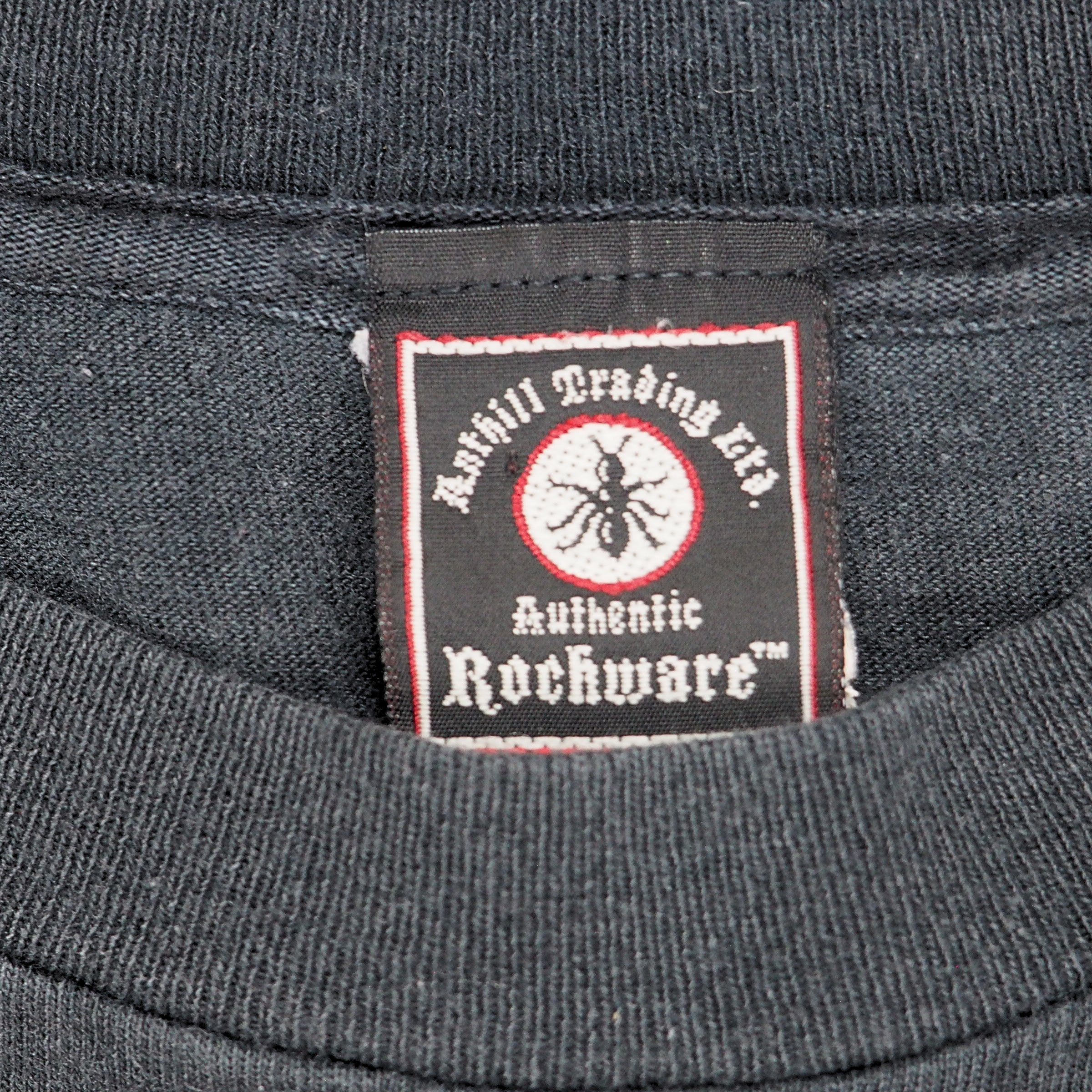 Close up of a brand label on the inside collar of a black t-shirt
