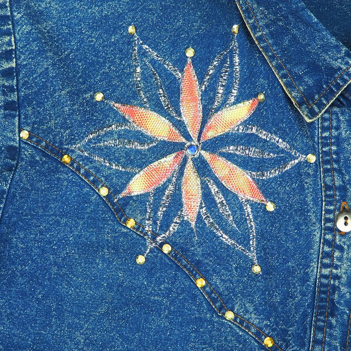 Blue denim shirt with a colorful embroidered and beaded flower design