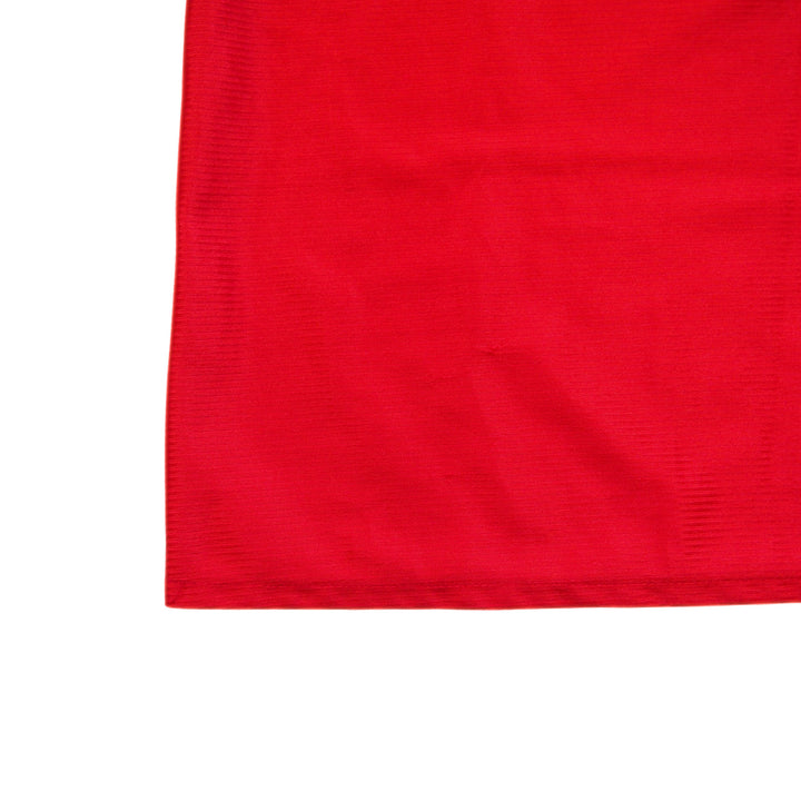 Red fabric texture on a white background