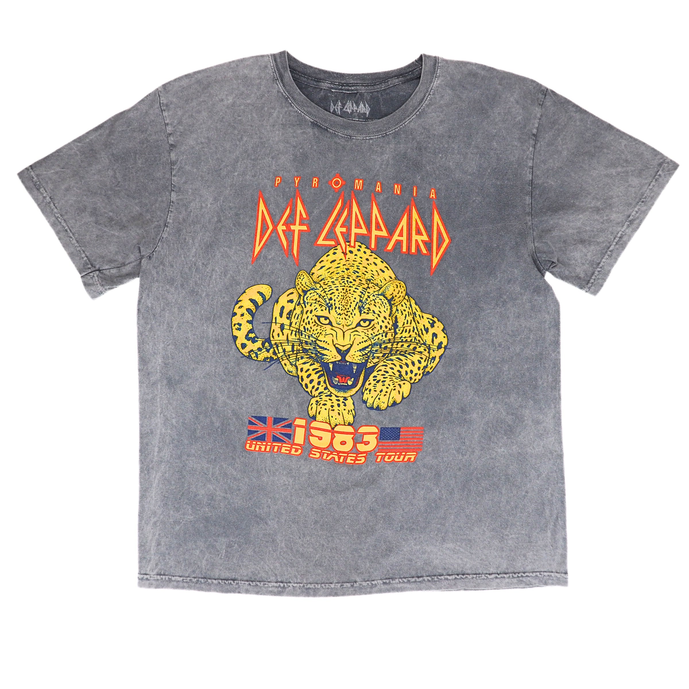 A washed gray short-sleeve t-shirt featuring a yellow leopard graphic and the text 'DEF LEPPARD' in orange, with '1983 UNITED STATES TOUR' printed below.