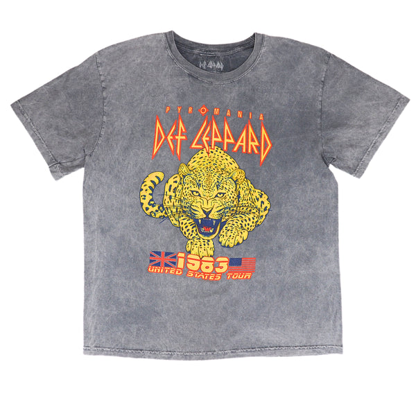 A washed gray short-sleeve t-shirt featuring a yellow leopard graphic and the text 'DEF LEPPARD' in orange, with '1983 UNITED STATES TOUR' printed below.