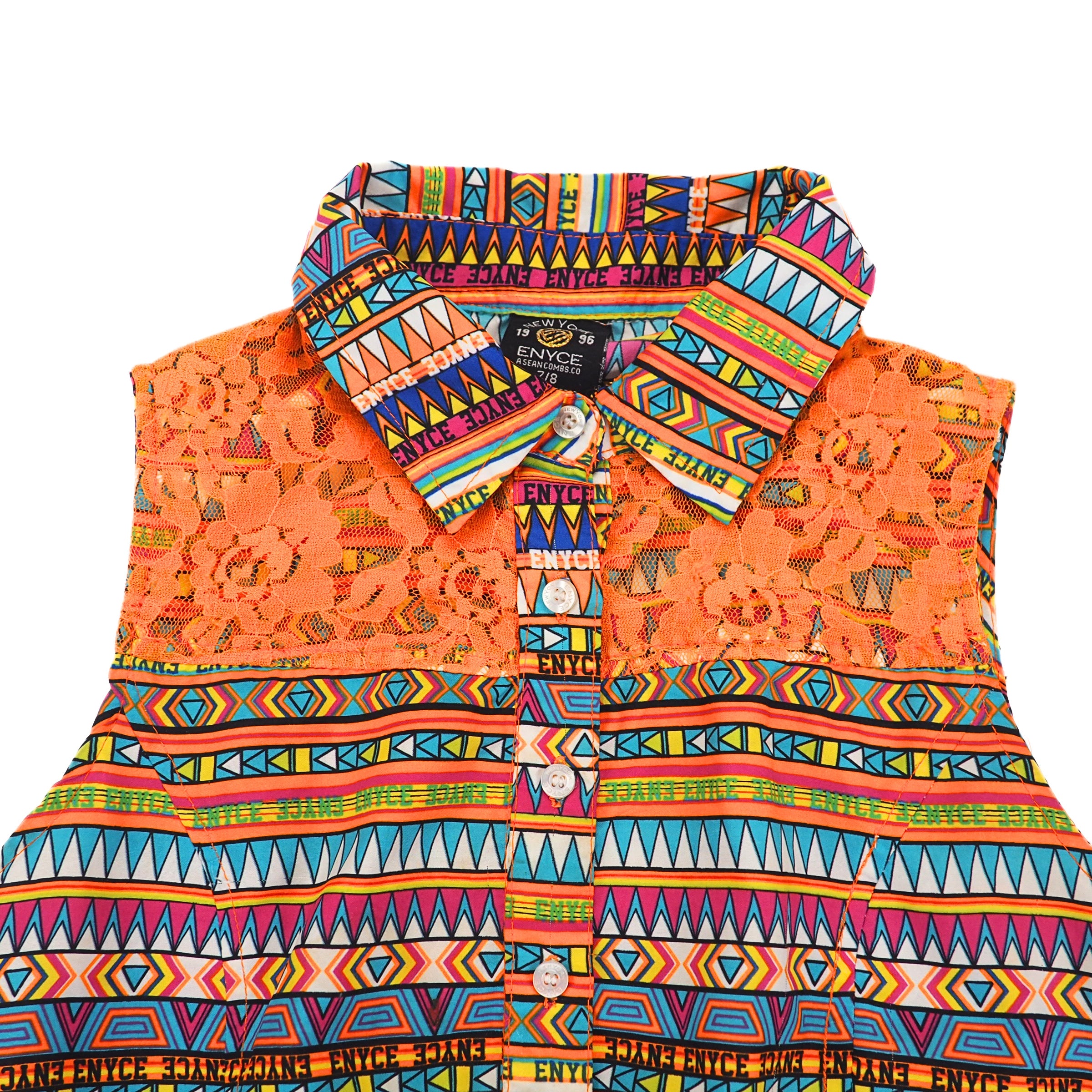Colorful patterned shirt with a vibrant geometric design on a white background