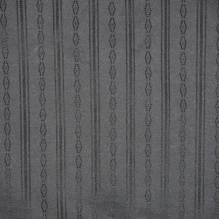 Detail of the woven pattern of a black shirt.