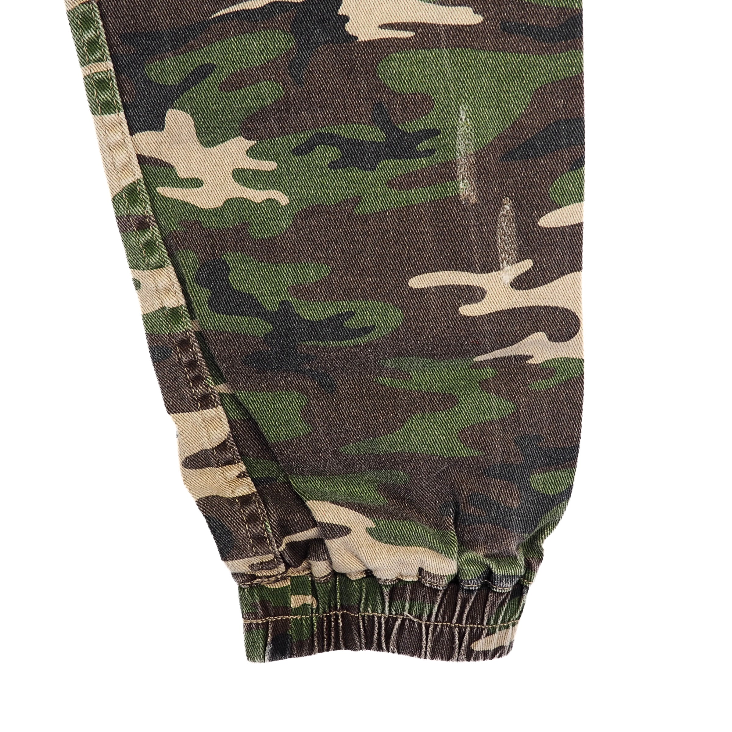 Camouflage pants leg with a white background