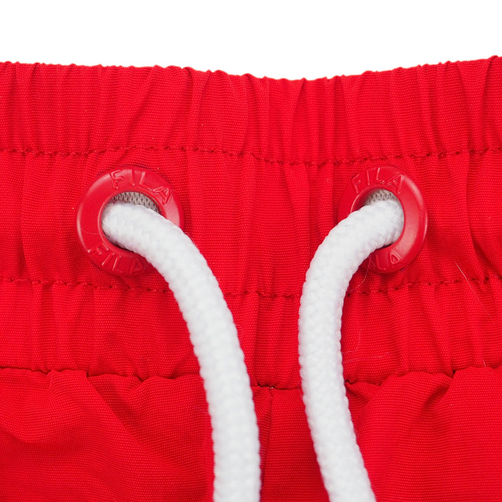 Close-up of red drawstring with white rope on a red background