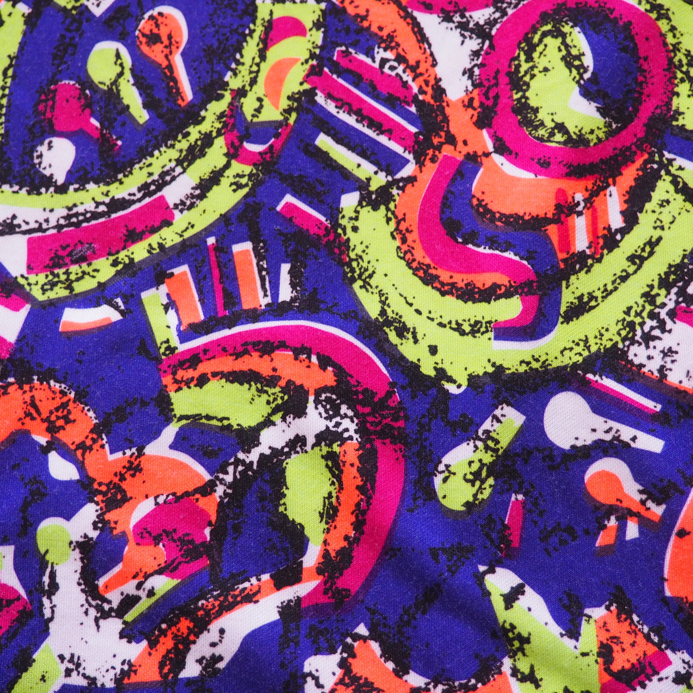 Colorful abstract pattern with wavy lines and shapes on a dark background