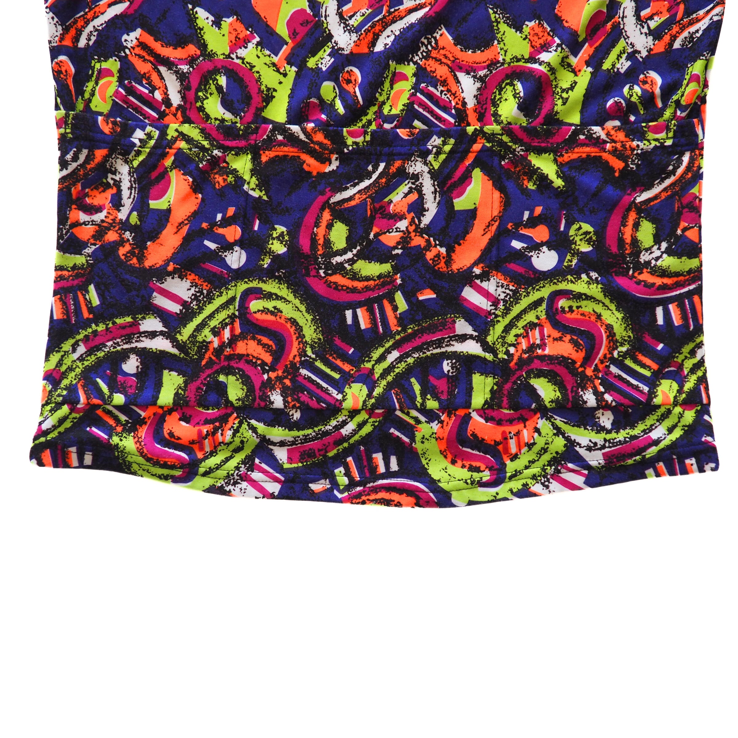 Colorful patterned fabric with vibrant colors on a white background