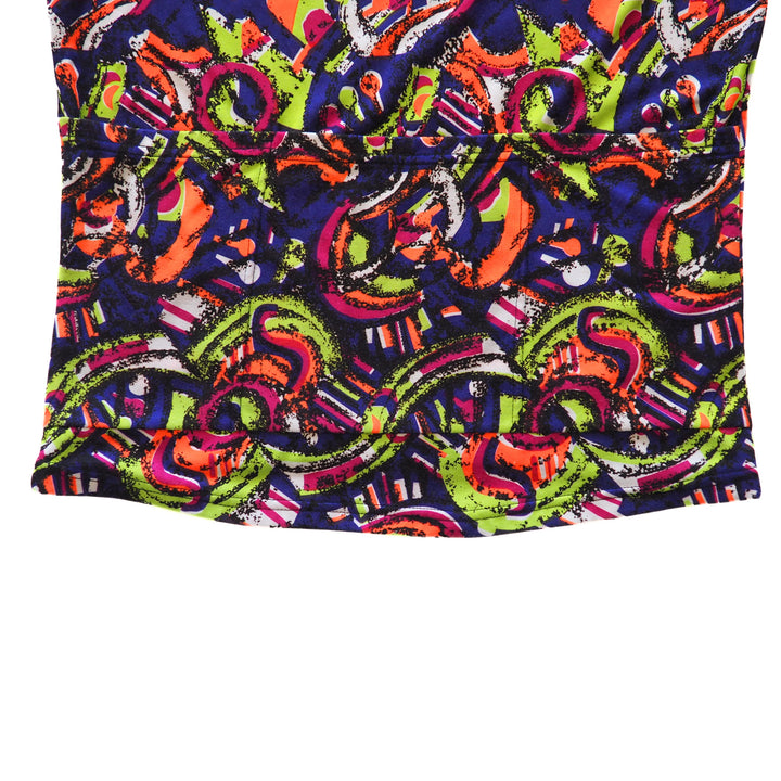 Colorful patterned fabric with vibrant colors on a white background