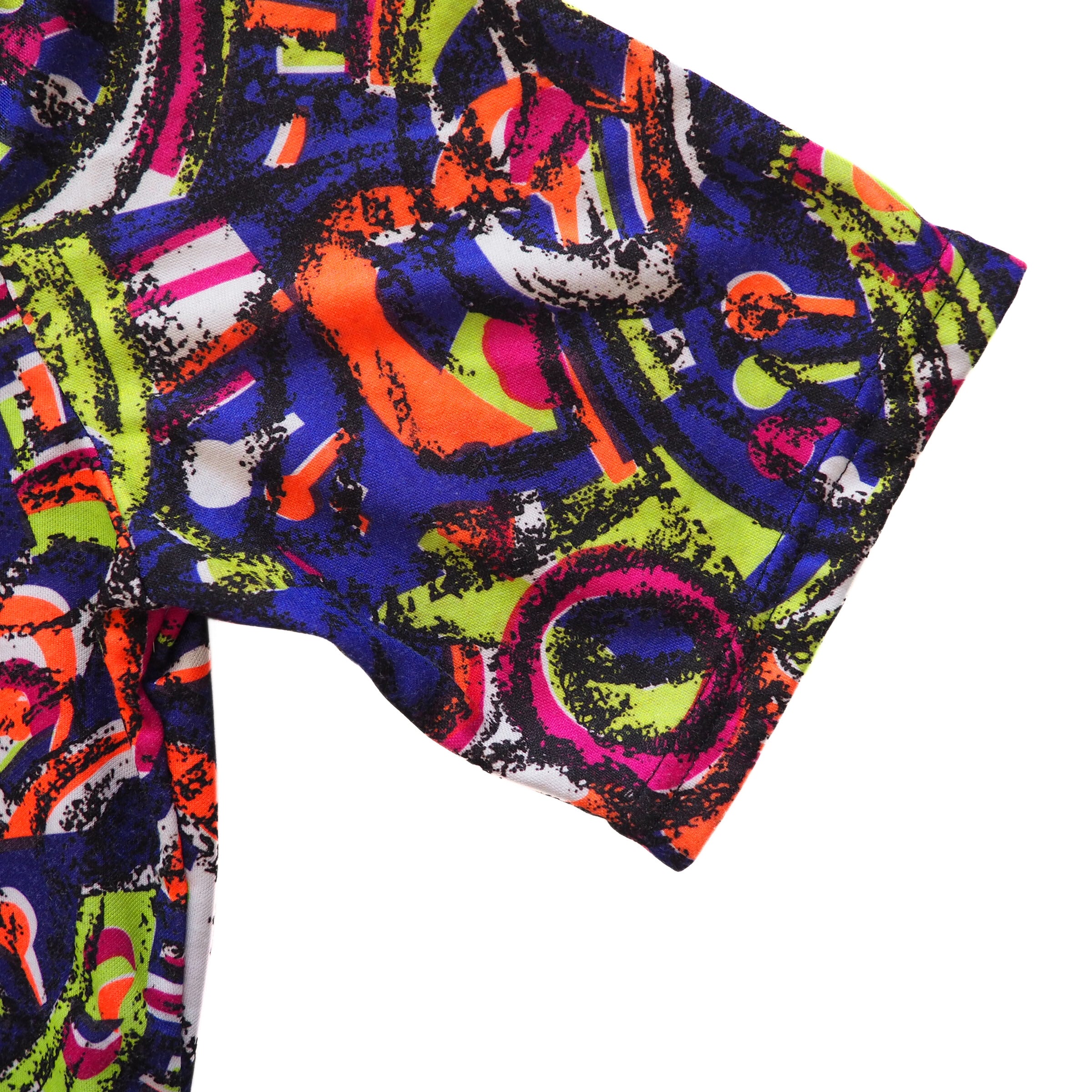 Colorful abstract patterned jersey sleeve on a white background