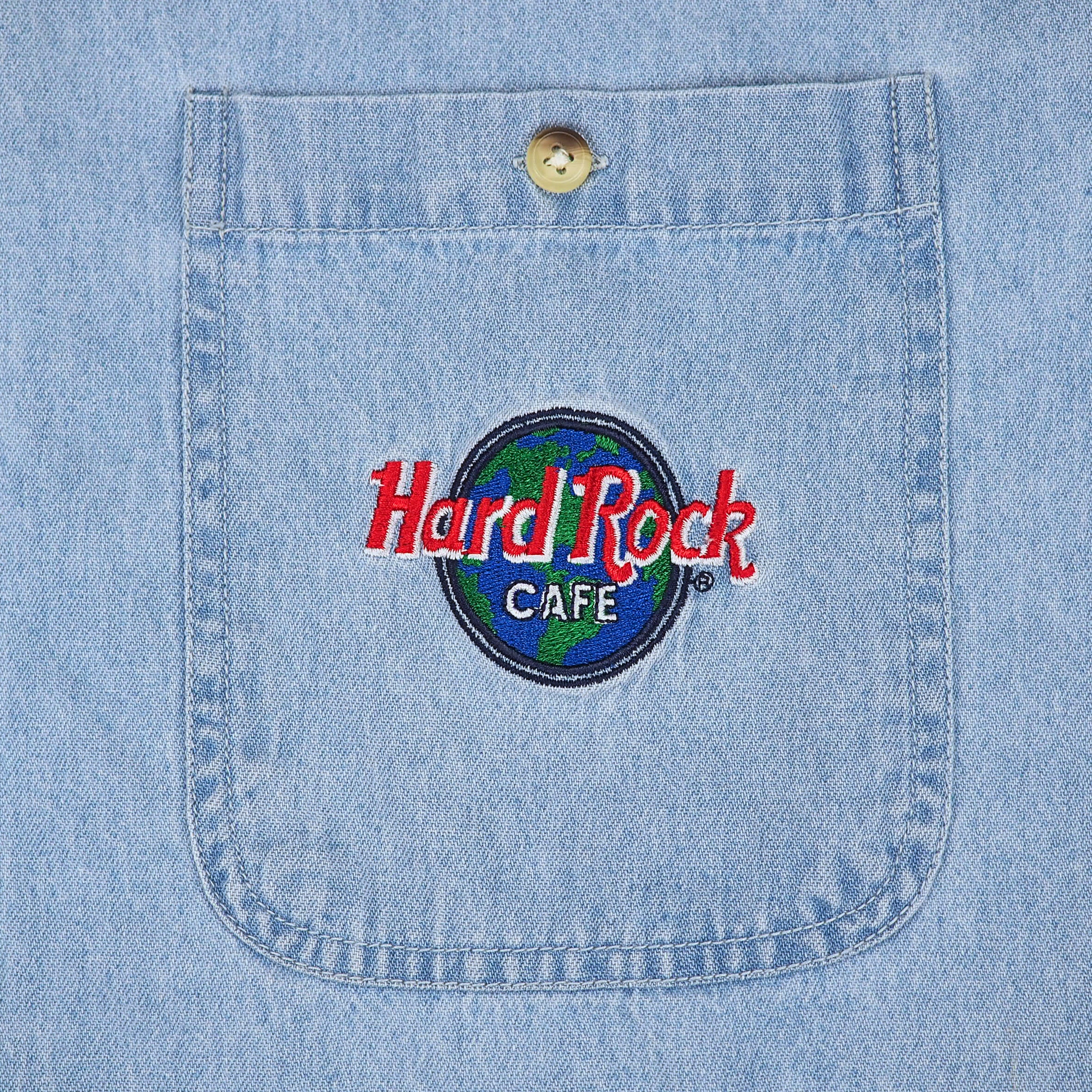 Embroidered Hard Rock Cafe logo on a denim shirt pocket