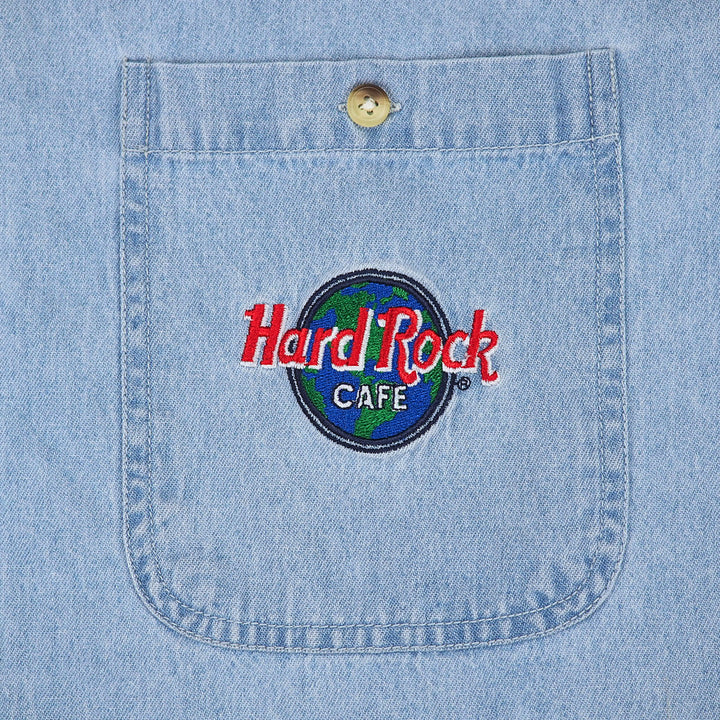 Embroidered Hard Rock Cafe logo on a denim shirt pocket
