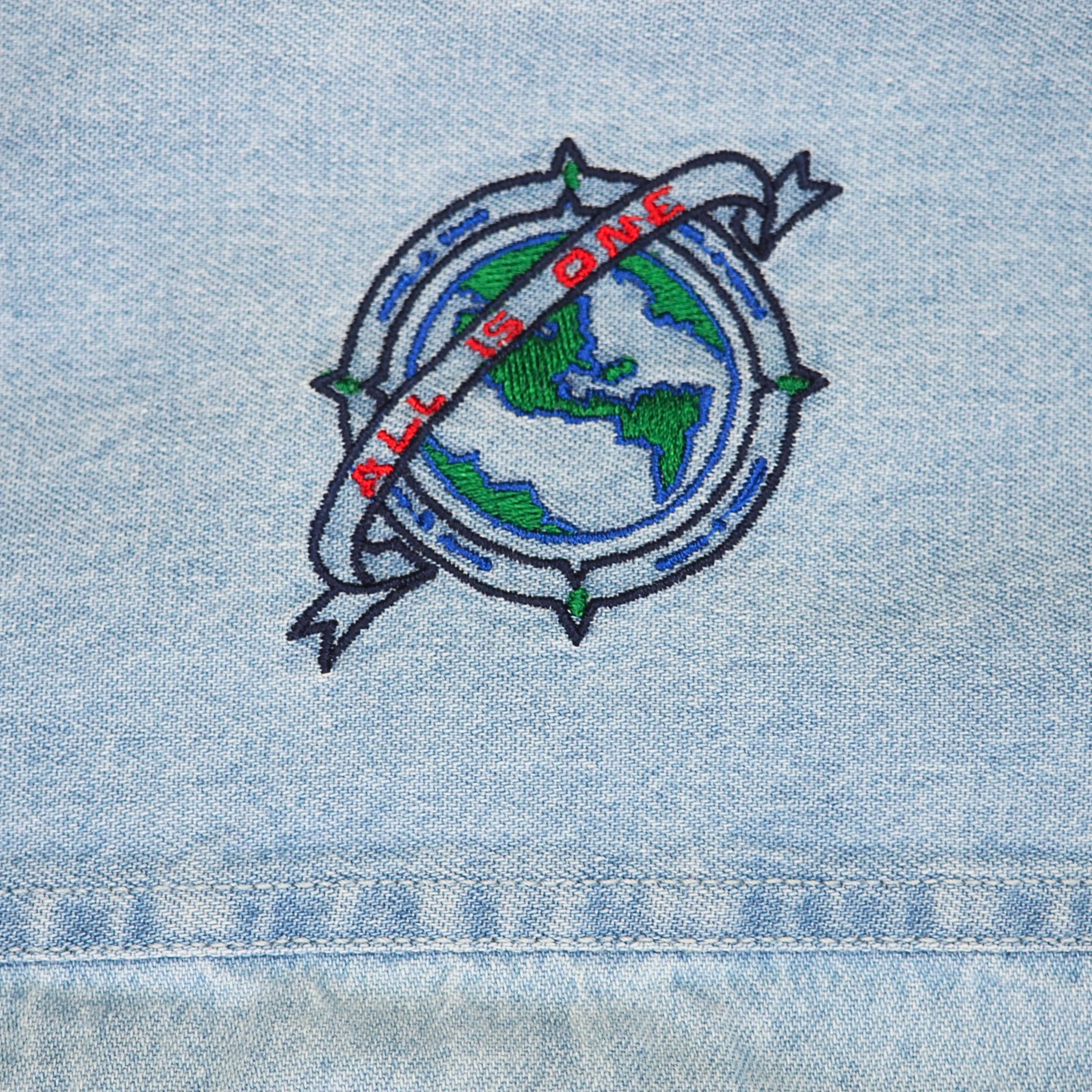Embroidered design for Hard Rock Cafe on denim fabric with 'All is One' text and world map.