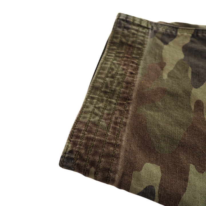 Close up of the ankle cuff of a pair of camouflage pants