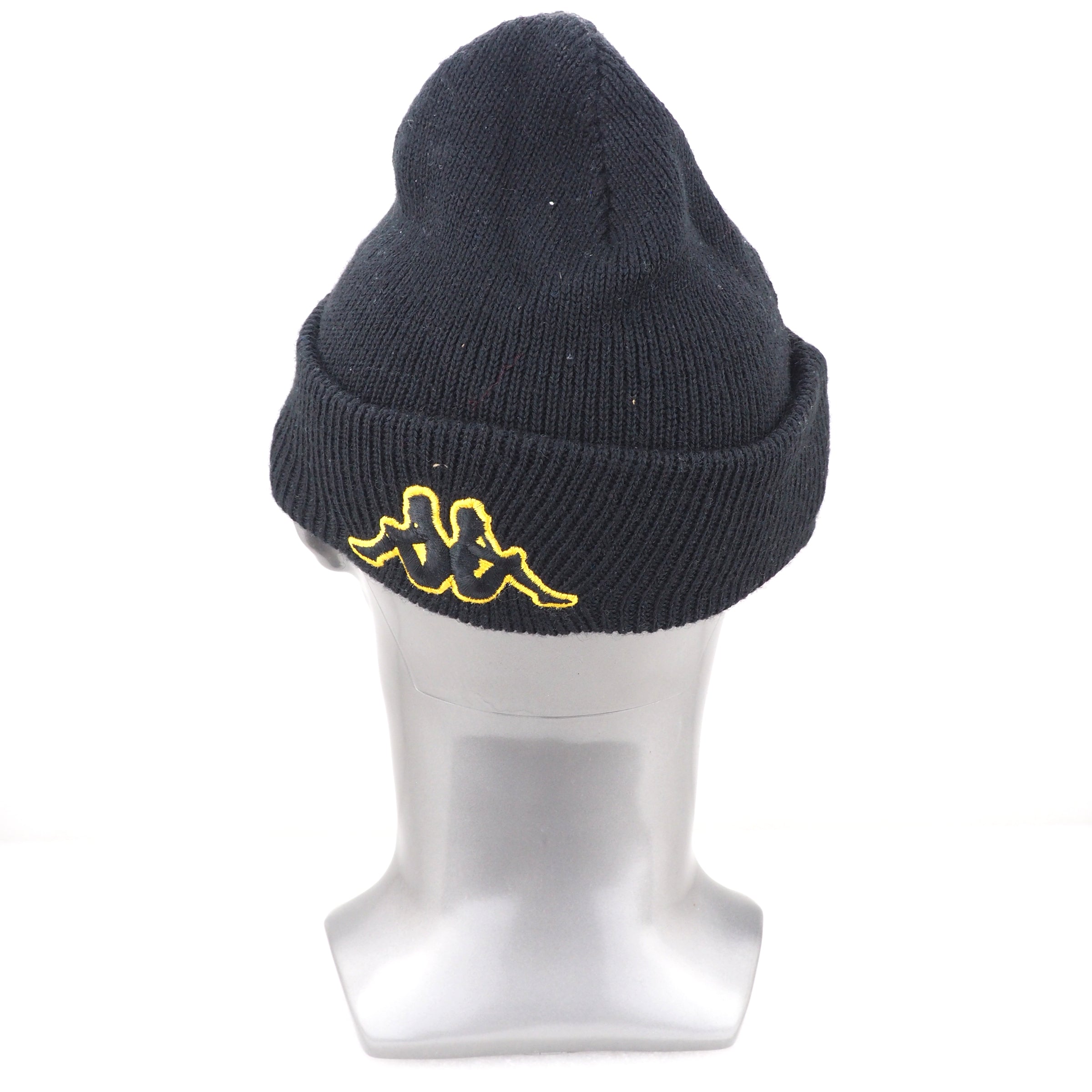 Black beanie with yellow kappa logo on a mannequin head against a white background