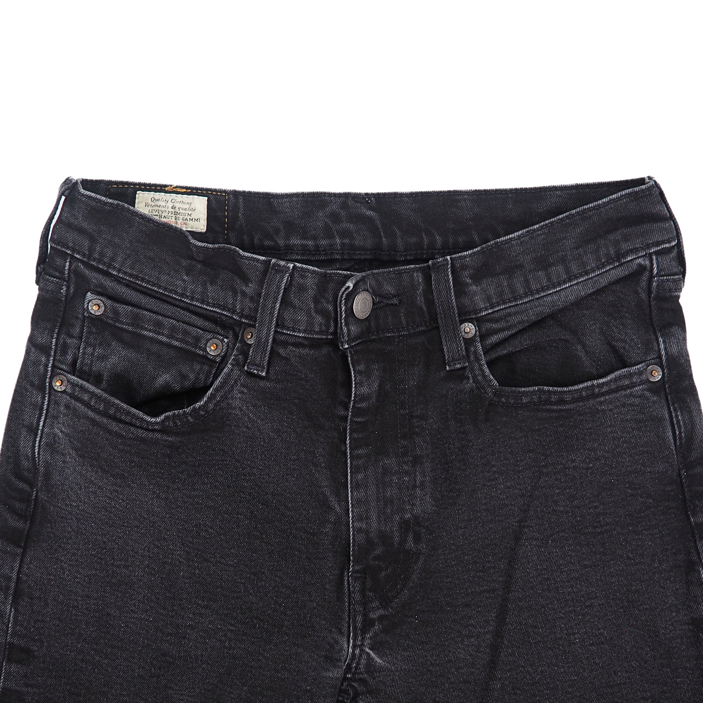 Black jeans with a visible levi's brand label on a white background