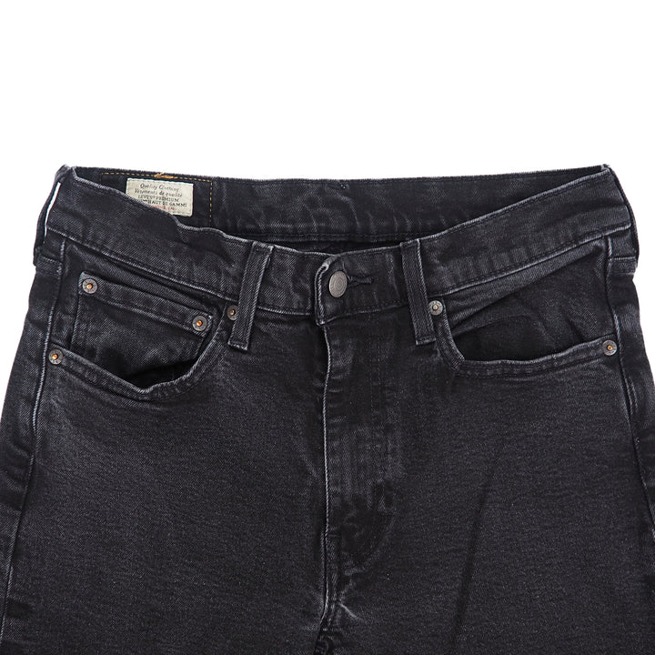 Black jeans with a visible levi's brand label on a white background