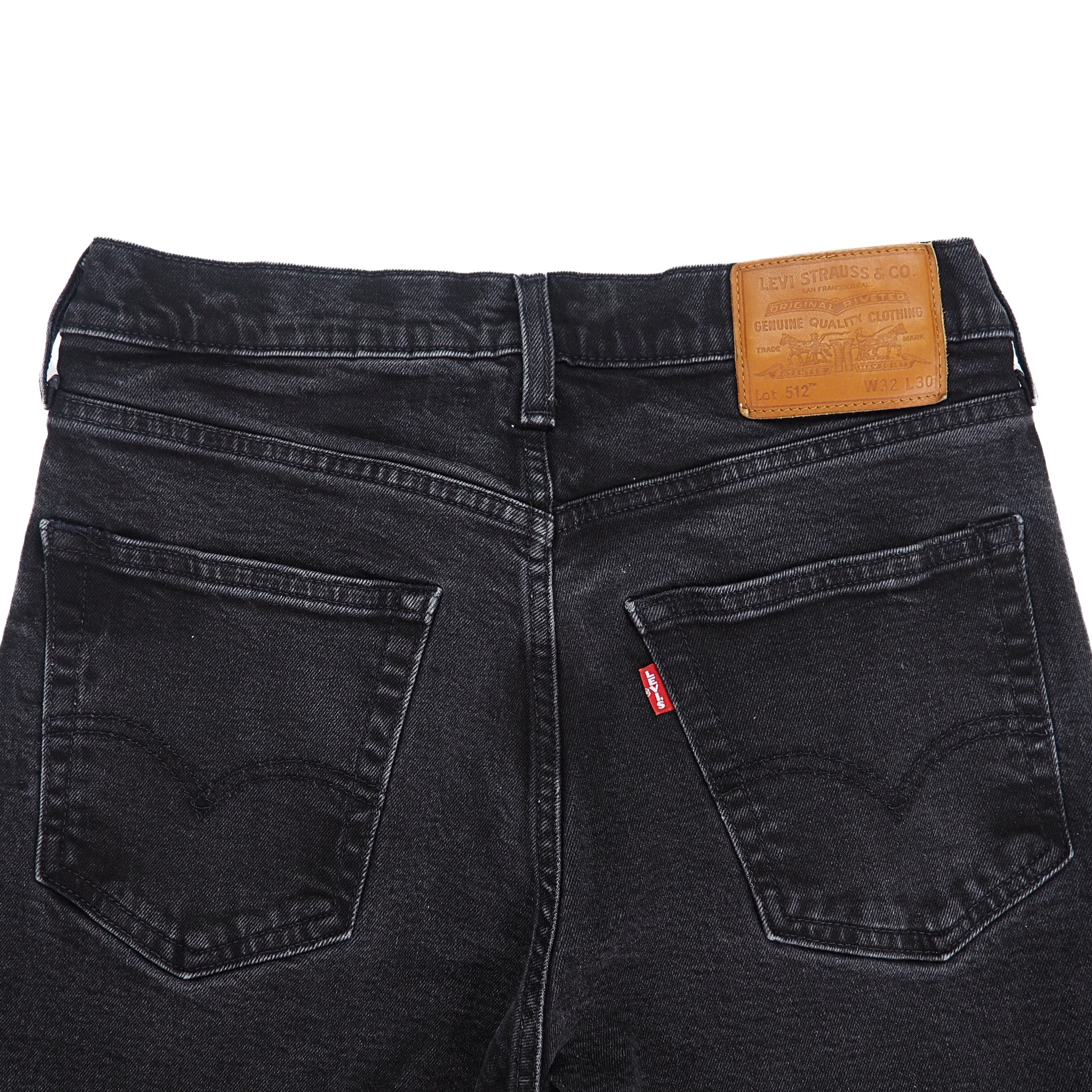 Black Levi's Big E jeans with a visible premium leather jarcon on a white background