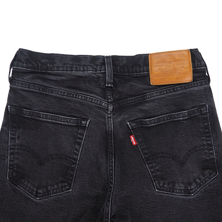 Black Levi's Big E jeans with a visible premium leather jarcon on a white background