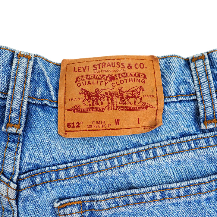 Levi's jeans waistband with a brown jarcon patch label on a white background