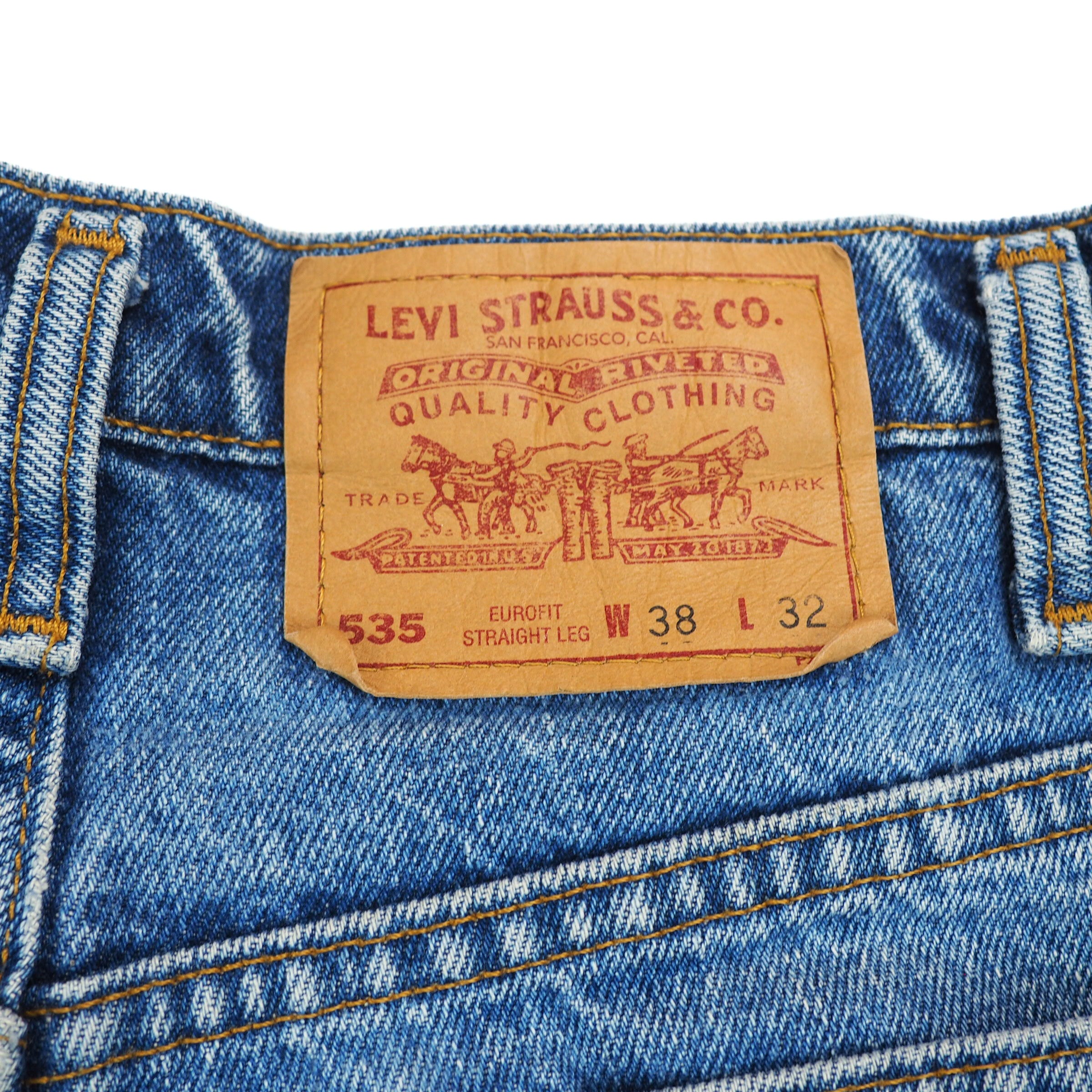 Levi's jeans jacron label on a blue denim background