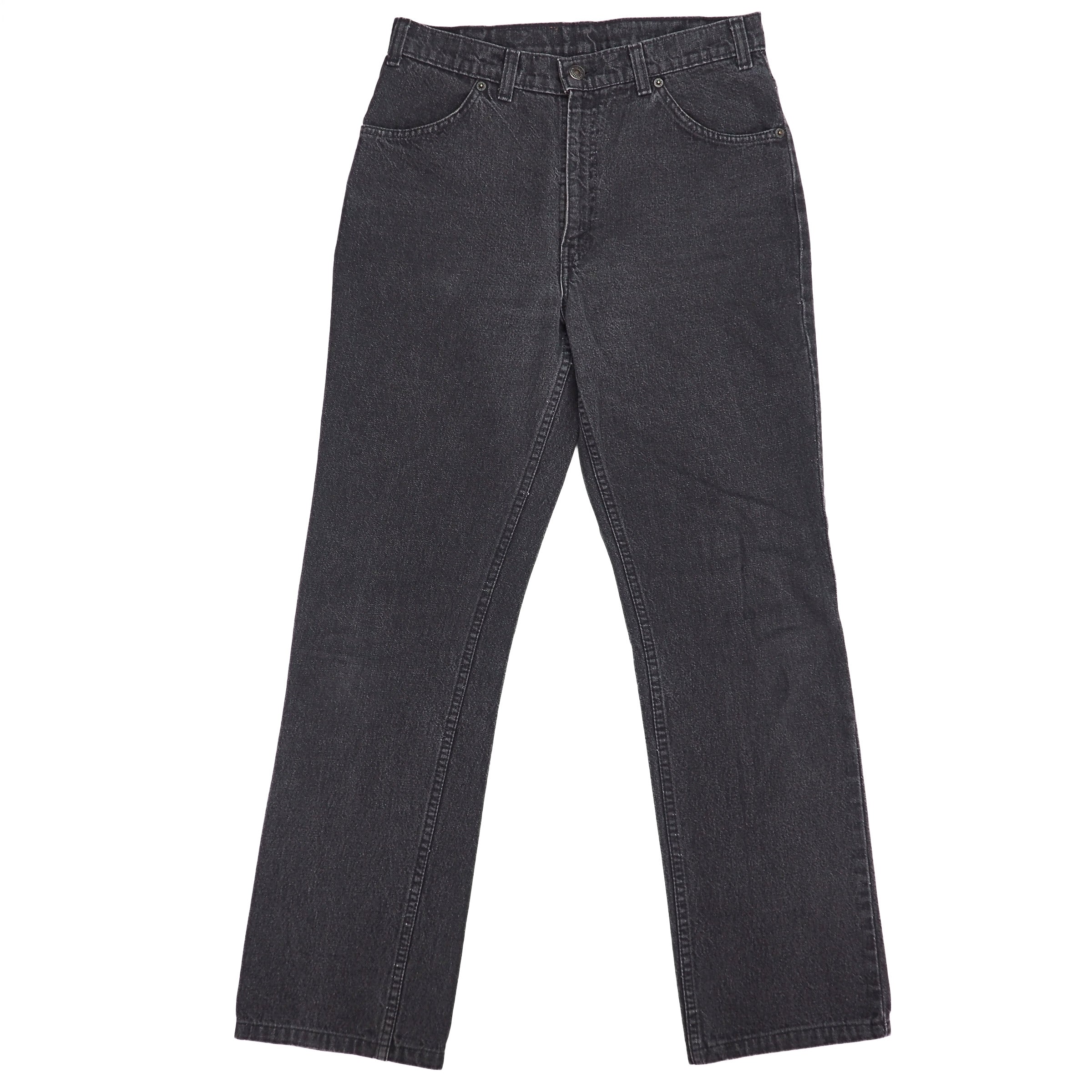Front view of a pair of black denim jeans on a white background