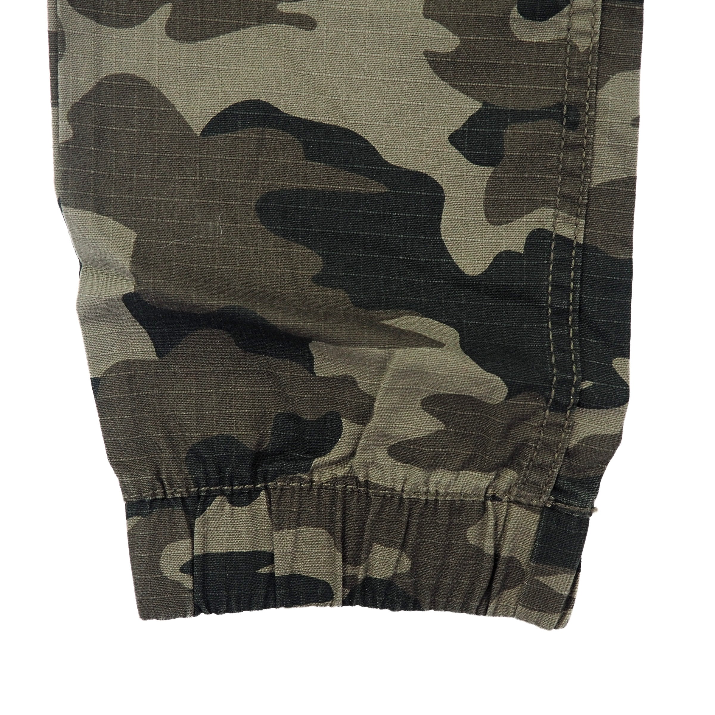 Camouflage pants ankle cuff with a white background