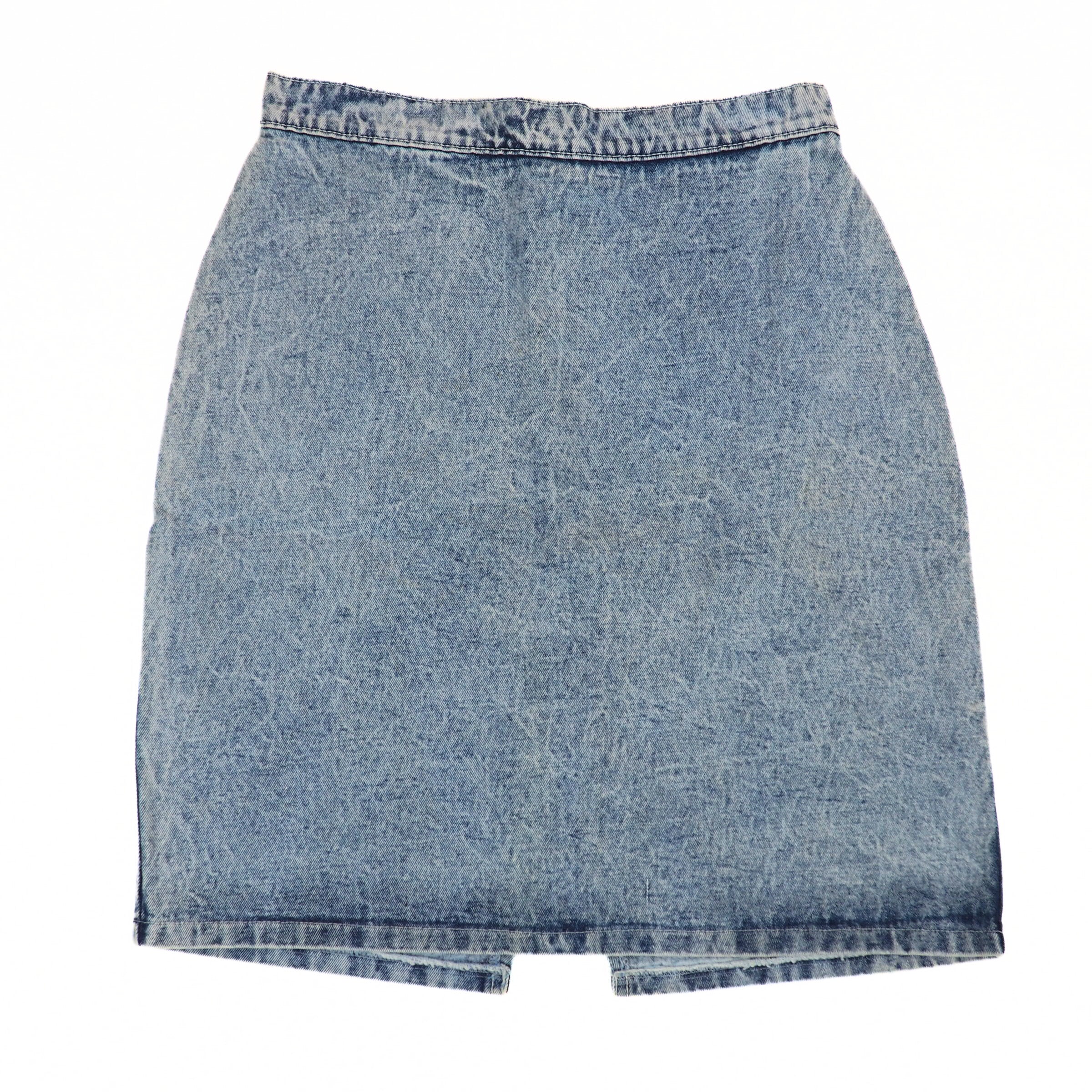 Back view of a light blue denim skirt on a white background.