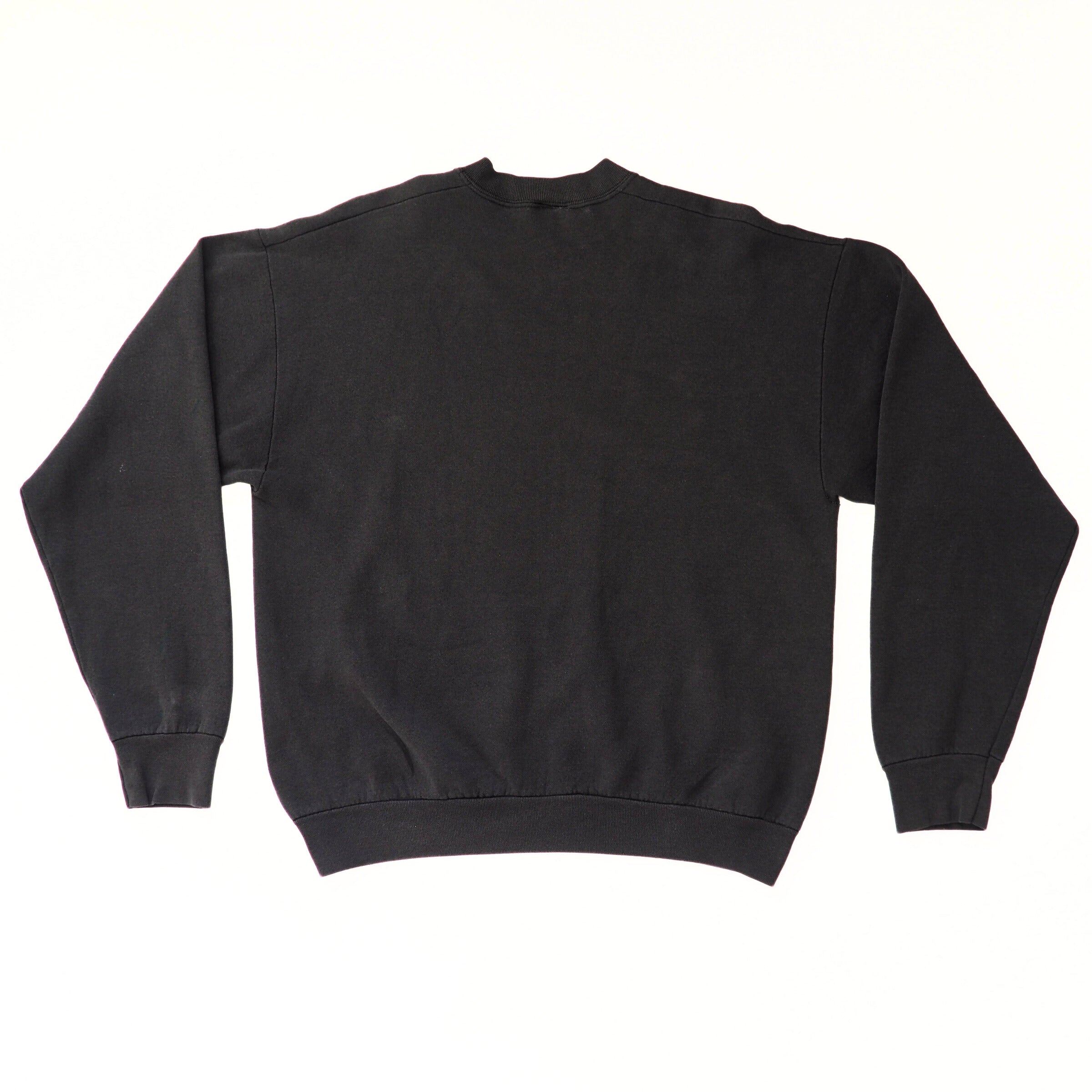 Back of a black sweatshirt on a white background