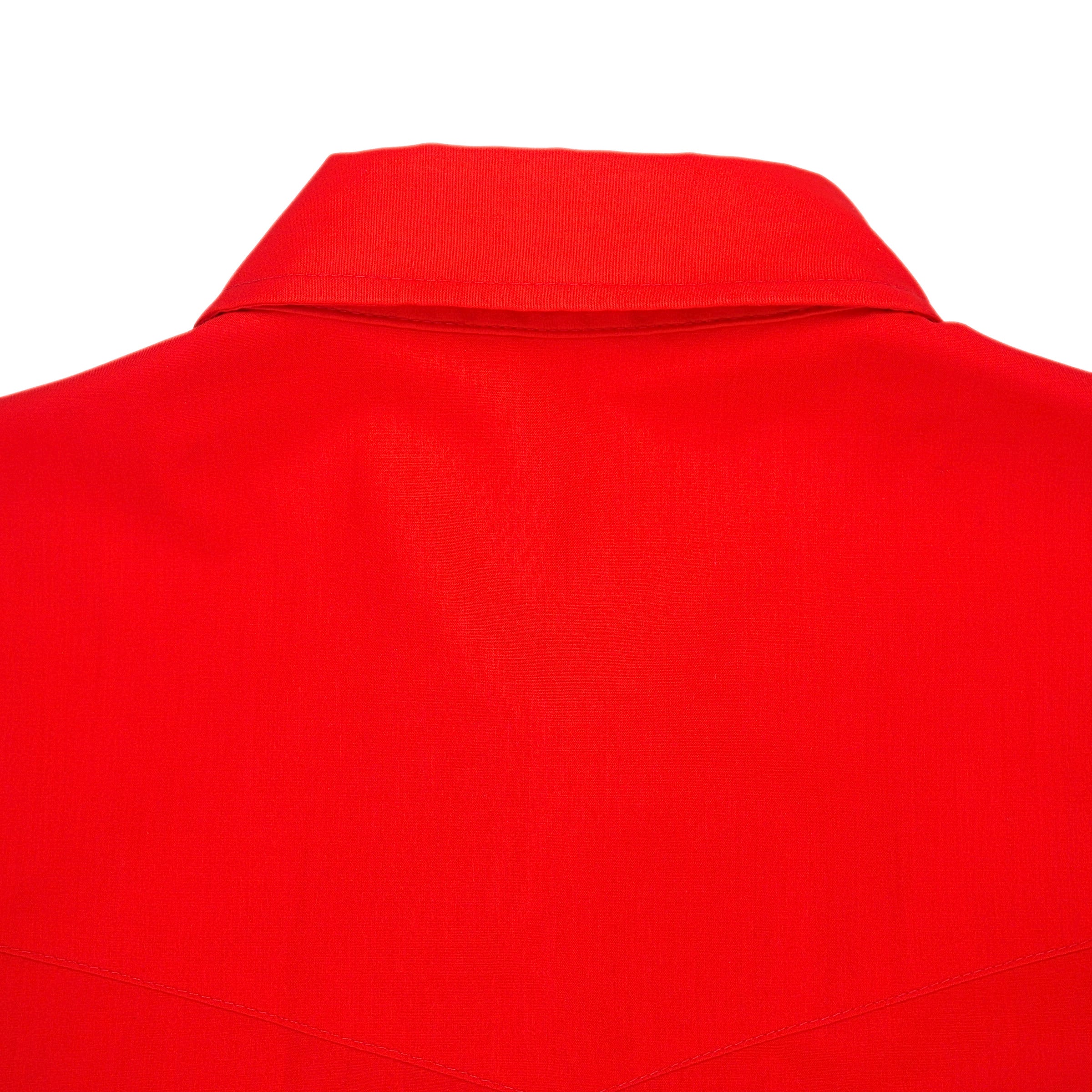 Back view of the collar of a red dress shirt.