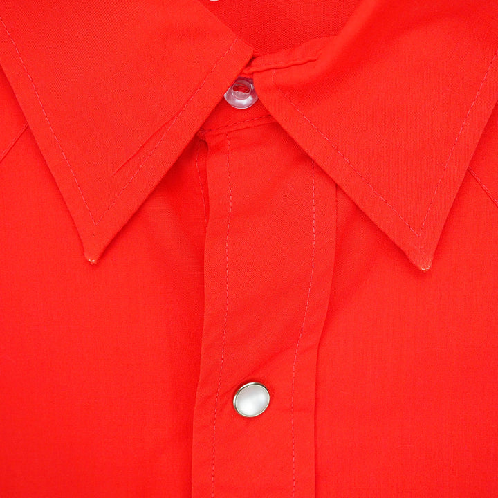 Close up of the collar of a red dress shirt.
