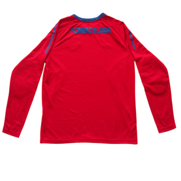 Red long-sleeve goalkeeper training jersey with 'FC Barcelona' branding on a white background