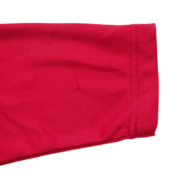 Close-up of a red jersey sleeve cuff on a white background