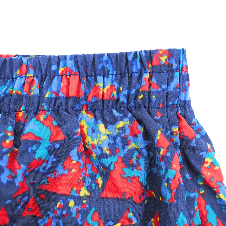 Colorful patterned shorts with a blue background