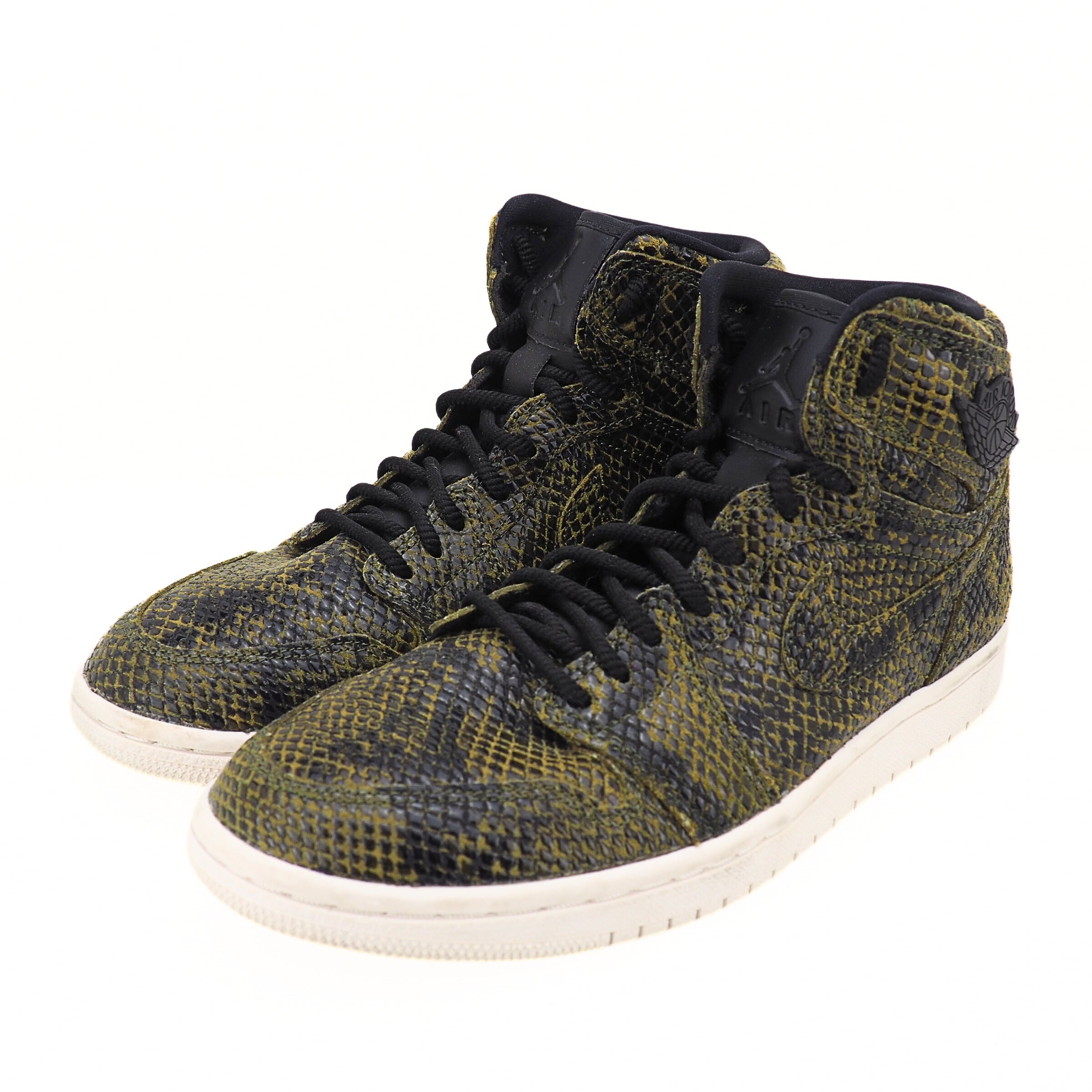 Air Jodan 1 high-top sneakers with snakeskin pattern, black laces and a white midsole on a white background