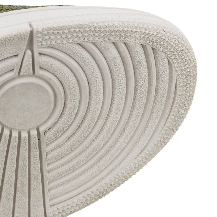 Close-up of a textured basketball shoe sole with stars and circular patterns