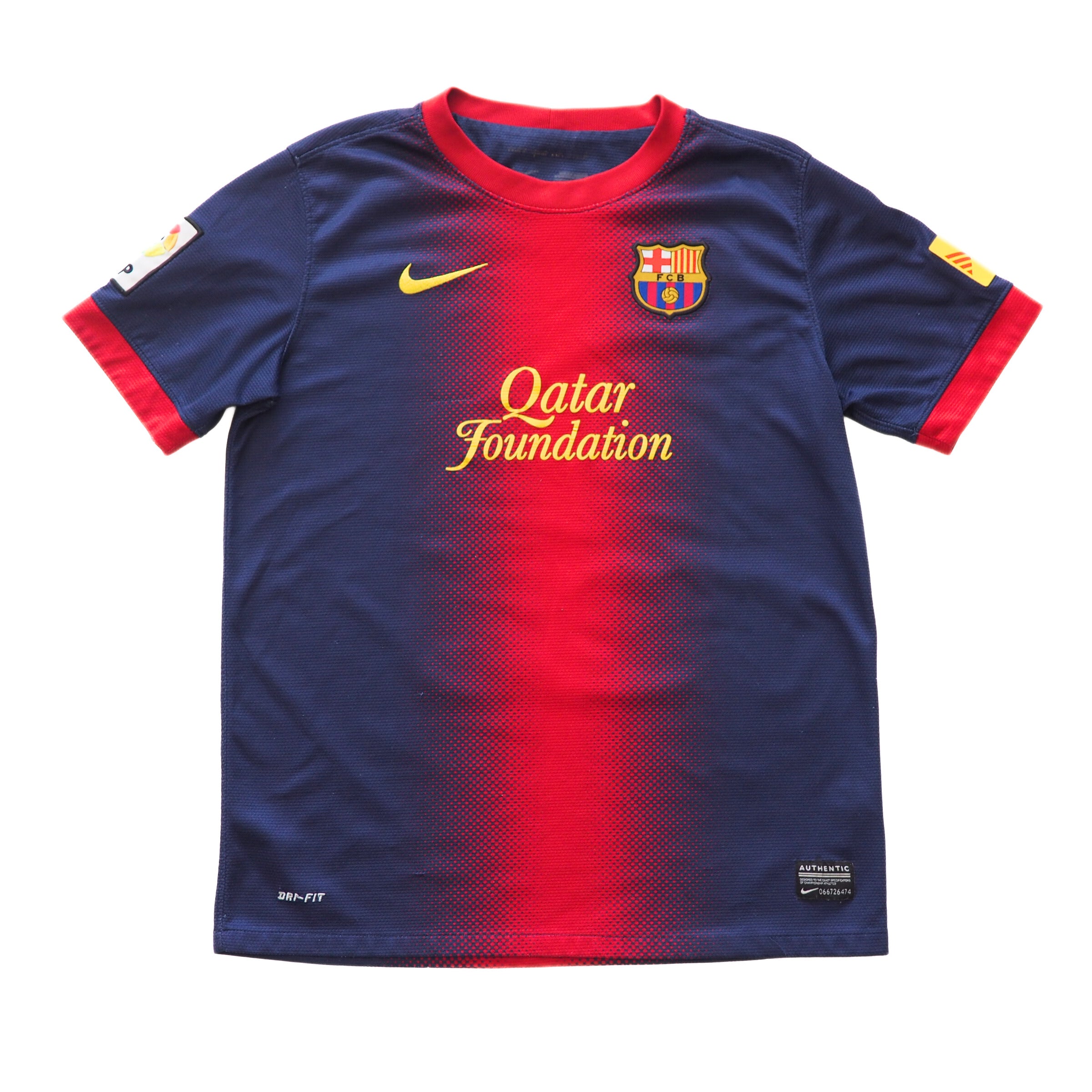 Blue and red FC Barcelona soccer jersey with visible 'Nike' and 'Qatar Foundation' branding on a white background