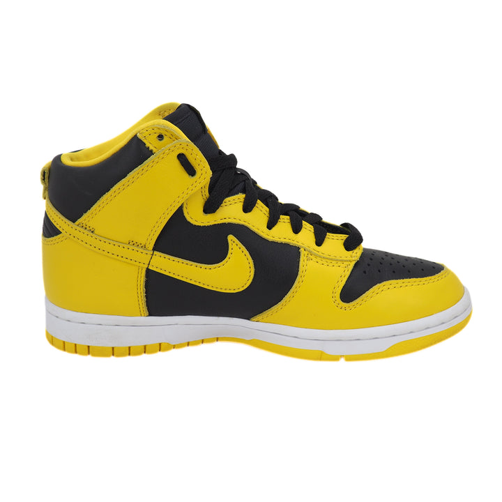 Yellow and black sneaker with a prominent Nike Swoosh logo on a white background