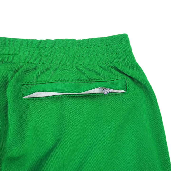 Green pants with a pocket on a white background