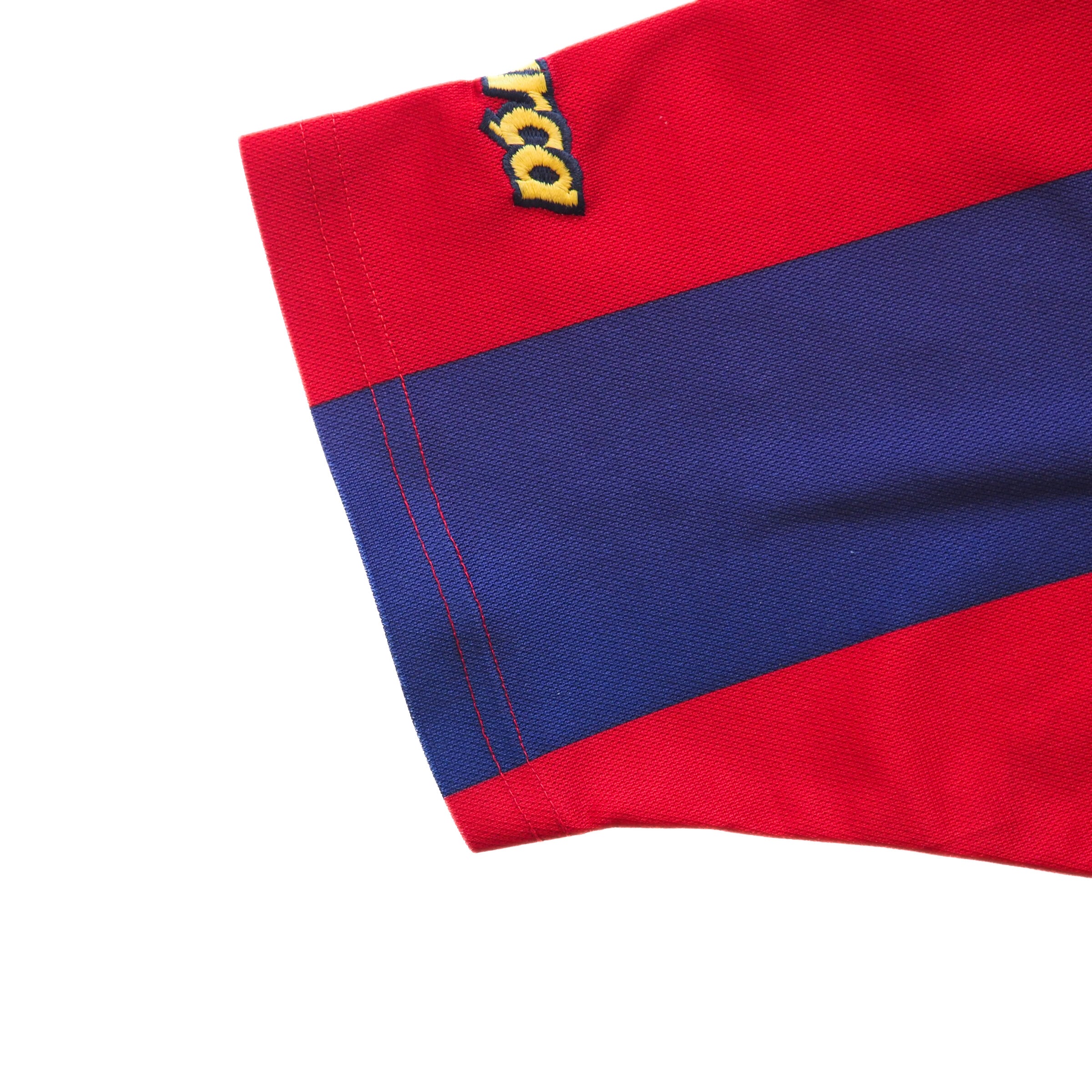 Close-up of a red and blue fabric with a brand logo on a white background