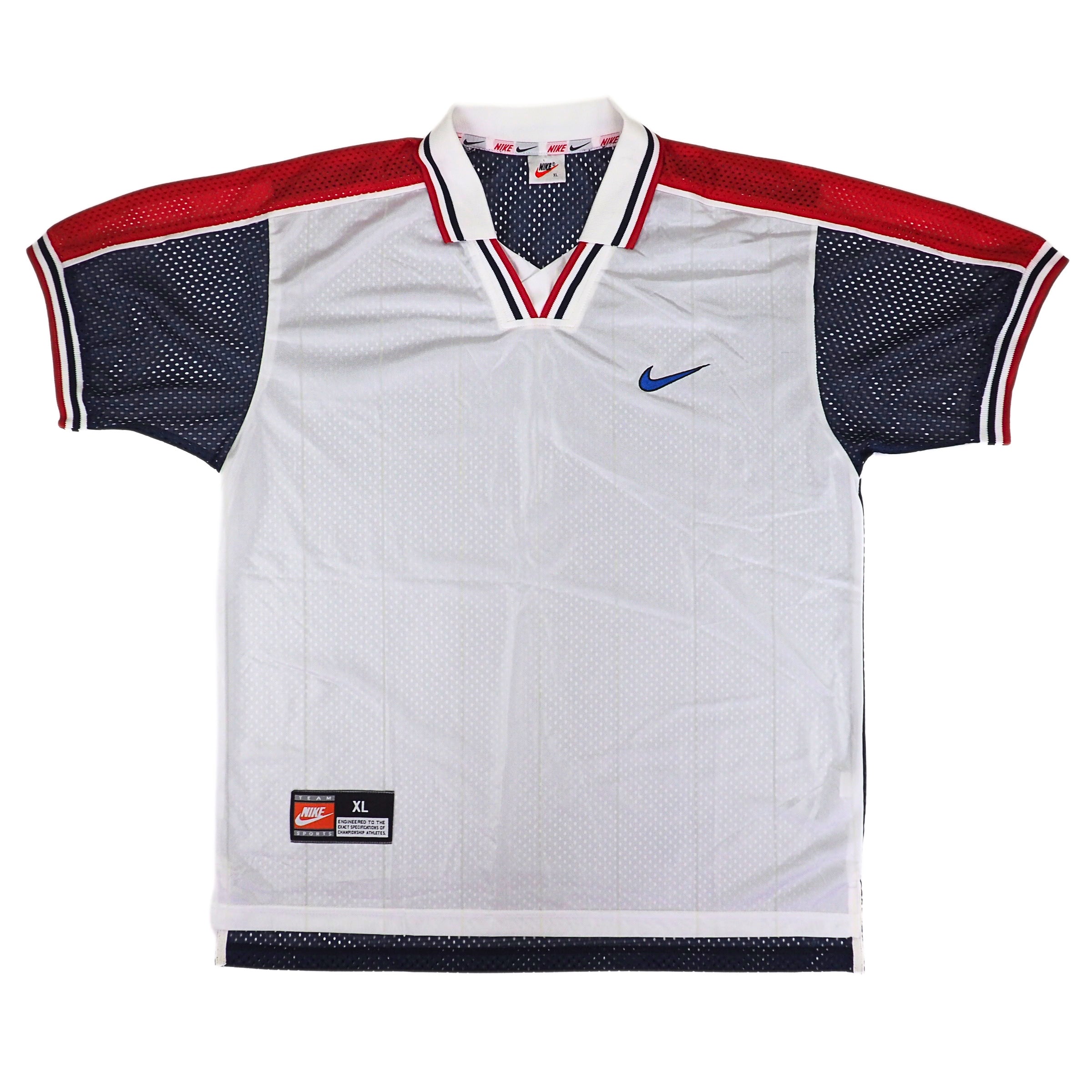 Front view of vintage 90s Nike Team Sports mesh Team USA soccer jersey in white, red and blue on a white background