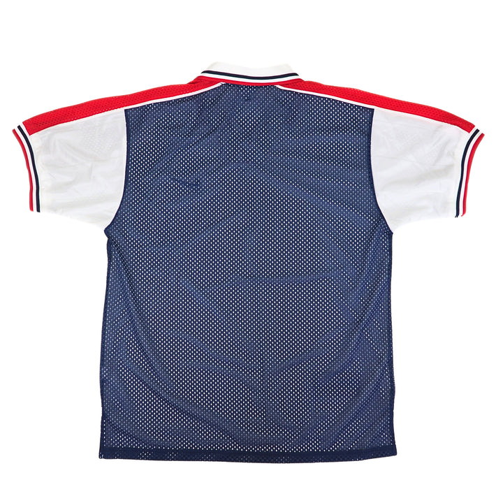 Back view of a vintage 90s nike team sports team usa red white and blue mesh soccer jersey on a white background