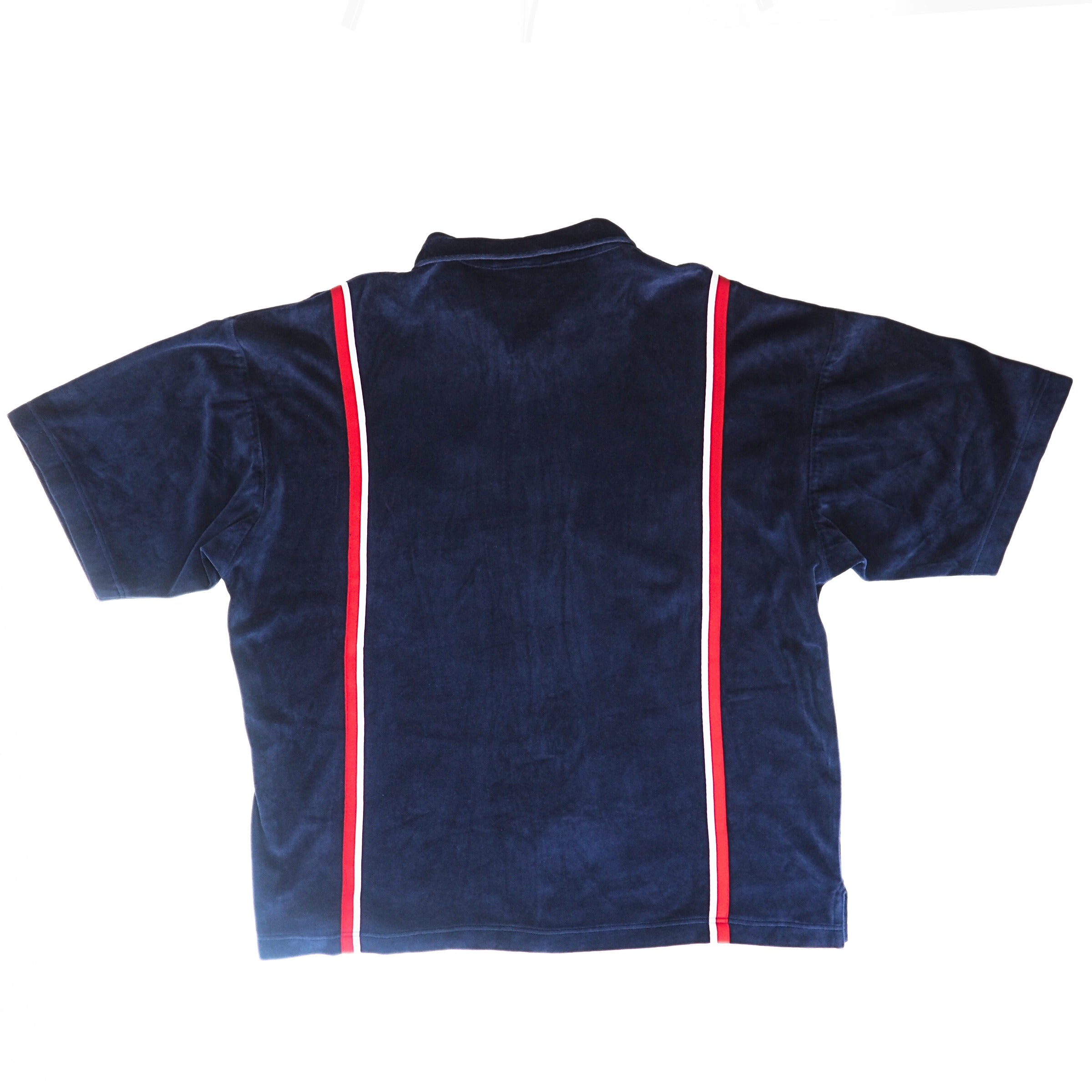 Back view of a navy blue velour jacket with red and white stripes