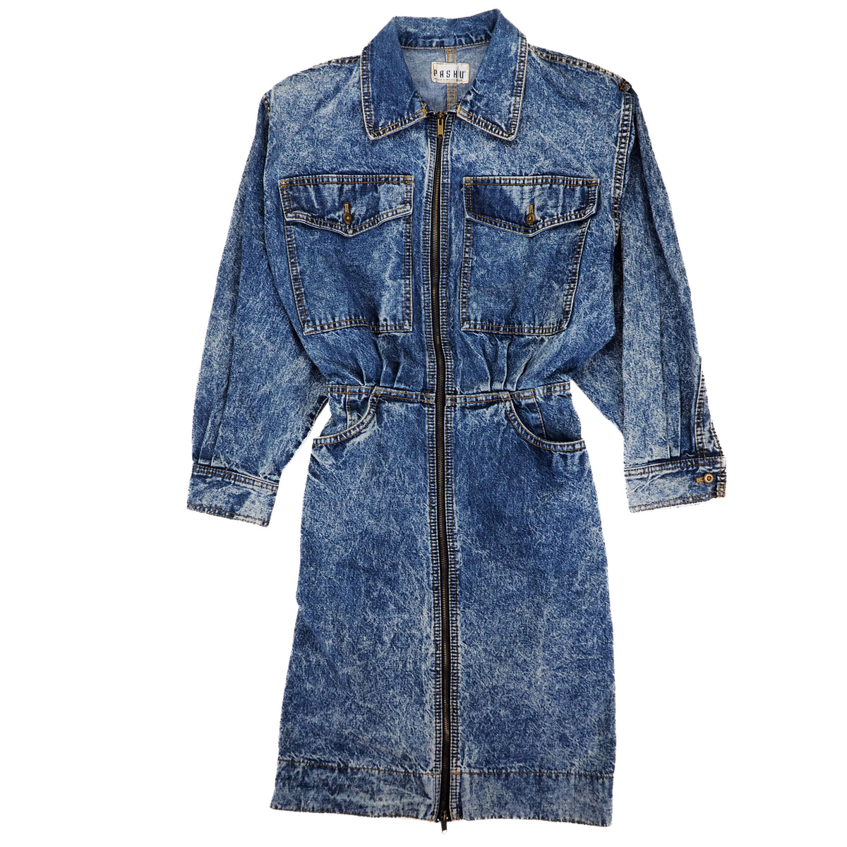 A blue acid-wash denim jumpsuit with a front zipper, collar, chest flap pockets, and a tie-waist belt, shown against a plain white background.
